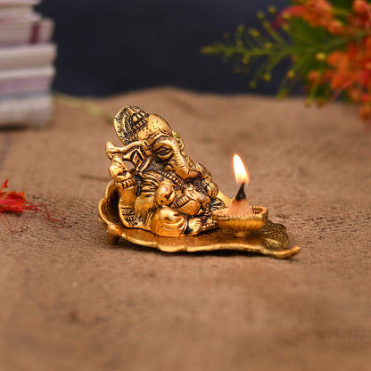 Ganesh Idol on Leaf - Lord Ganesha with Diya - The Indian Rang